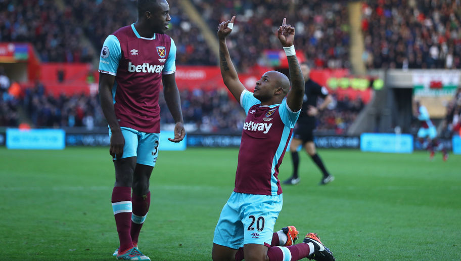 SWANSEA, WALES - DECEMBER 26:  Andre Ayew (R) of West Ham United celebrates scoring the opening goal with Michail Antonio of West Ham United during the Premier League match between Swansea City and West Ham United at Liberty Stadium on December 26, 2016 in Swansea, Wales.  (Photo by Michael Steele/Getty Images)